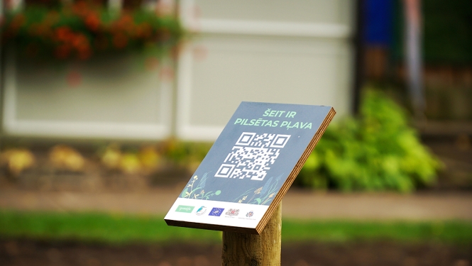 Uzraksts Pilsētas pļava